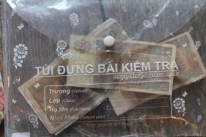 Due to the exchange rate, I bought this plastic pouch to carry the the hundreds of notes that make up $100 USD