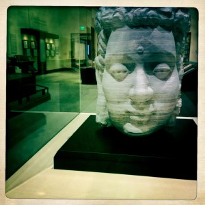 A Buddha of layered paper